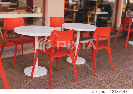 Cafe table and chairs on urban street - summer restaurant and coffee shop outdoor concept Cafe table and chairs on urban street - summer restaurant and coffee shop outdoor concept 101875482