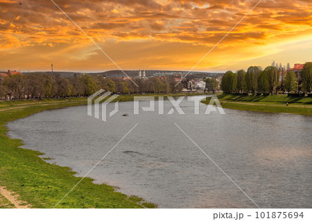 Dramatic sunset lamdscape over Uzh River in Uzhhorod, Ukraine. 101875694