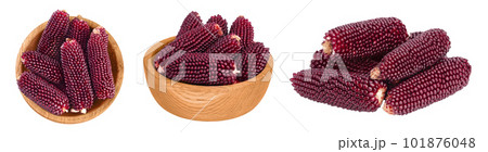 Purple corn in wooden bowl isolated on white background with full depth of field. Top view. Flat lay. Purple corn in wooden bowl isolated on white background with full depth of field. Top view. Flat lay. 101876048