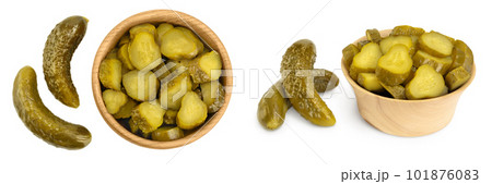 Marinated pickled cucumber in wooden bowl isolated on white background with full depth of field. Top view. Flat lay Marinated pickled cucumber in wooden bowl isolated on white background with full depth of field. Top view. Flat lay 101876083