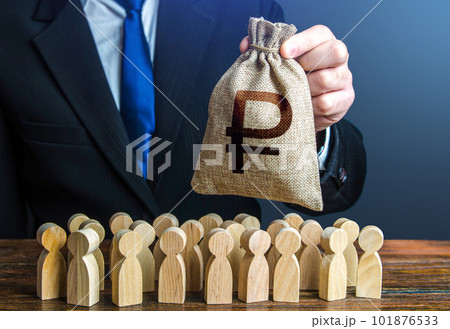 A businessman is holding a russian ruble money bag over a crowd of people figurines. Staff maintenance, tax collection, provide grants , and pay salaries. Distribution of funds. Financial support. 101876533