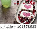 delicious ice cream with berry heart filling in middle and chia seeds water. healthy summer dessert. close-up 101878683