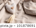 Mothers day background with soft beige heart on fabric backdrop. Symbol of love. soft focus. close-up 101878691