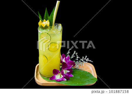 Fresh drink with Kumquat and citrus juice isolated on black background Fresh drink with Kumquat and citrus juice isolated on black background 101887158