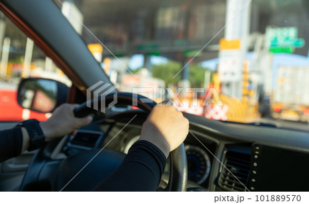People driving car on city road People driving car on city road 101889570