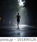 athlete runnerforest trail in the rain 101890126