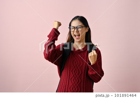Overjoyed Asian female college student rejoicing, extremely happy, yes gesture, pass the exam Overjoyed Asian female college student rejoicing, extremely happy, yes gesture, pass the exam 101891464