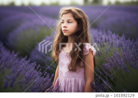 Beautiful little girl in lavender field at sunset. Girl with long hair. Generative AI 101892129