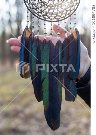 Handmade dream catcher with feathers threads and beads rope hanging Handmade dream catcher with feathers threads and beads rope hanging 101894788