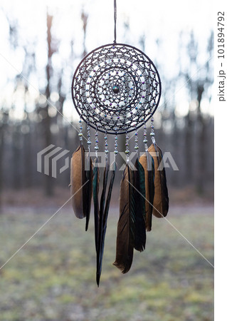 Handmade dream catcher with feathers threads and beads rope hanging Handmade dream catcher with feathers threads and beads rope hanging 101894792