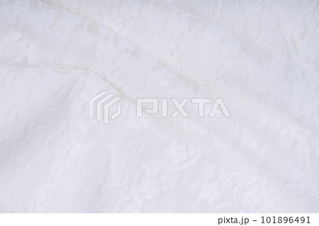 The white background with lace flower. Texture background pattern. The white background with lace flower. Texture background pattern. 101896491