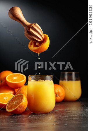 Orange juice is squeezed from fresh fruit. Orange juice is squeezed from fresh fruit. 101903836