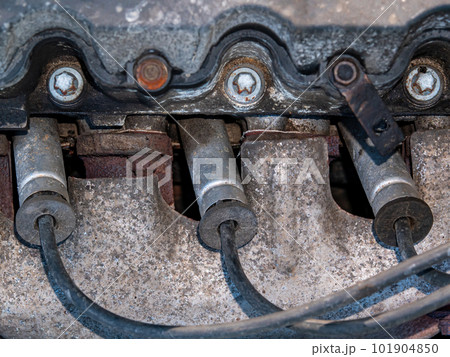 Wires for connecting the spark plugs of a car engine. 101904850