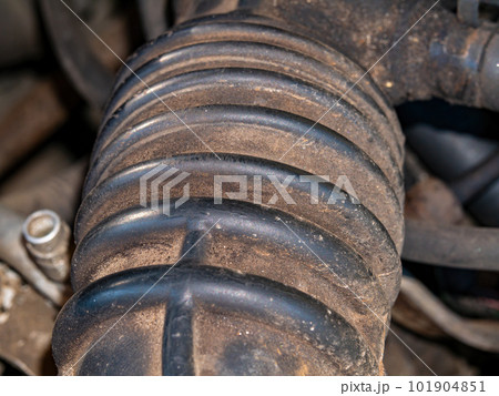 Rubber pipe of the exhaust system of a car engine. Rubber pipe of the exhaust system of a car engine. 101904851
