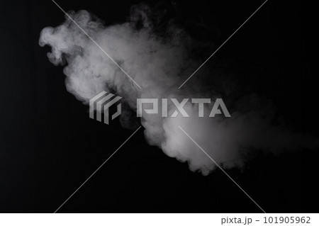 Cloud of white smoke on a black background closeup Cloud of white smoke on a black background closeup 101905962