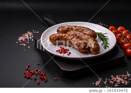 Delicious fried grilled sausages with salt, spices and herbs Delicious fried grilled sausages with salt, spices and herbs 101910478