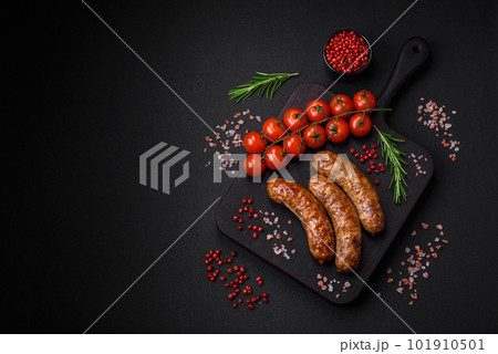 Delicious fried grilled sausages with salt, spices and herbs 101910501