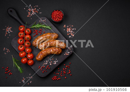 Delicious fried grilled sausages with salt, spices and herbs Delicious fried grilled sausages with salt, spices and herbs 101910508