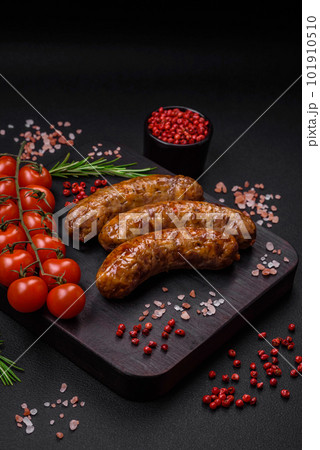Delicious fried grilled sausages with salt, spices and herbs 101910510