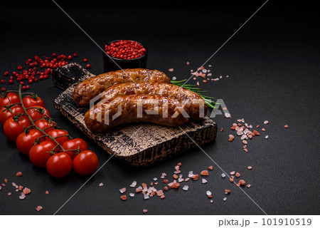 Delicious fried grilled sausages with salt, spices and herbs Delicious fried grilled sausages with salt, spices and herbs 101910519