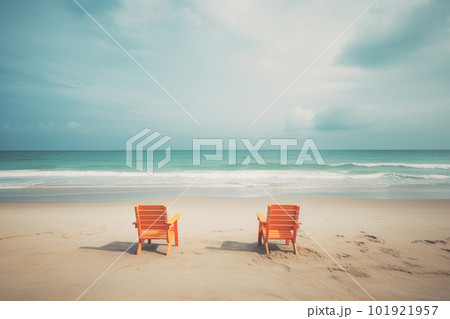 Two wooden chairs on the tropical beach with blue sky background, vintage tone Two wooden chairs on the tropical beach with blue sky background, vintage tone 101921957