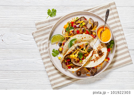 Beef Steak Tacos with veggies, avocado, corn Beef Steak Tacos with veggies, avocado, corn 101922303