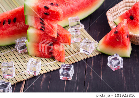 watermelon on wooden background 101922816
