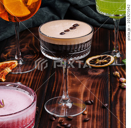 different colorful exotic alcoholic cocktails on wood different colorful exotic alcoholic cocktails on wood 101925042