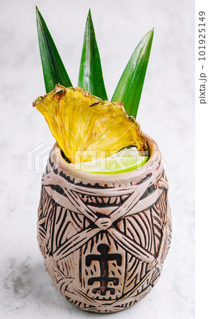 Tropical pineapple cocktail drink with lime 101925149