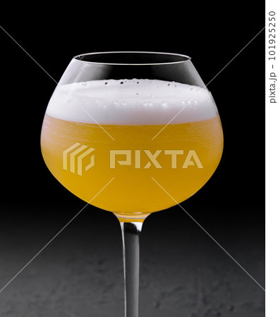 refreshing passionfruit martini cocktail on stone 101925250