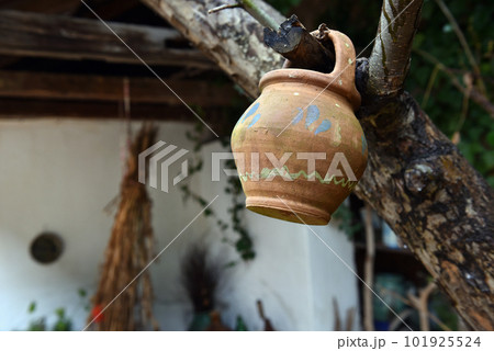 Hanging old ceramic jug Hanging old ceramic jug 101925524