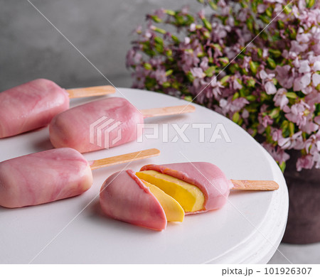 Mousse dessert in the form of popsicle ice cream Mousse dessert in the form of popsicle ice cream 101926307