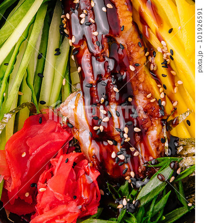 Hawaiian salmon poke bowl with cucumber, mango and pickled ginger Hawaiian salmon poke bowl with cucumber, mango and pickled ginger 101926591