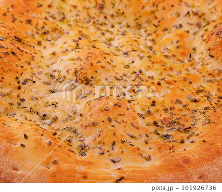 Italian focaccia bread close up background 101926736