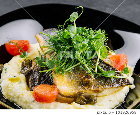 Fried norwegian skrei cod fish filet with mashed potatoes Fried norwegian skrei cod fish filet with mashed potatoes 101926959