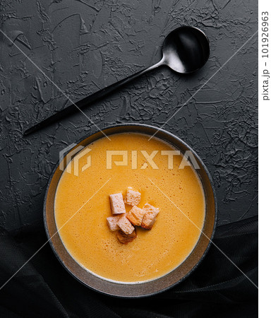 cheese soup with crackers top view 101926963