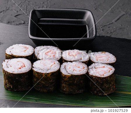 Ebi maki - sushi roll with shrimps on black board 101927529