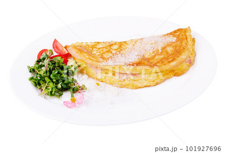 Omelette with ham cherry tomatoes on plate Omelette with ham cherry tomatoes on plate 101927696