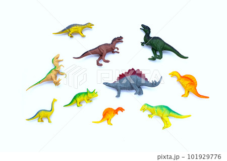 Plastic dinosaur toys on white background. Top view 101929776