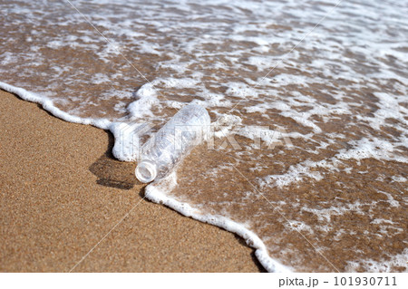 Plastic bottle on the beach 101930711
