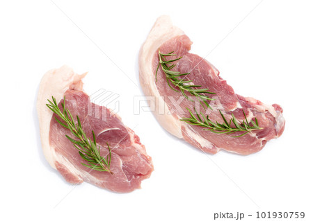 Pork meat with rosemary on white background. 101930759