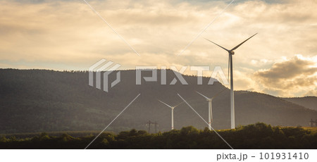 Wind turbines at the mountain landsape. Green power energy generation. Wind turbines at the mountain landsape. Green power energy generation. 101931410