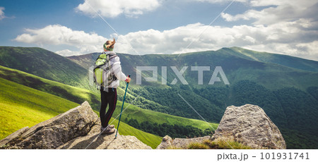 Young woman n the top of the mountains Young woman n the top of the mountains 101931741