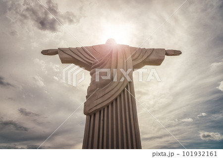 Jesus Christ with open arms statue. dramatic sky Jesus Christ with open arms statue. dramatic sky 101932161