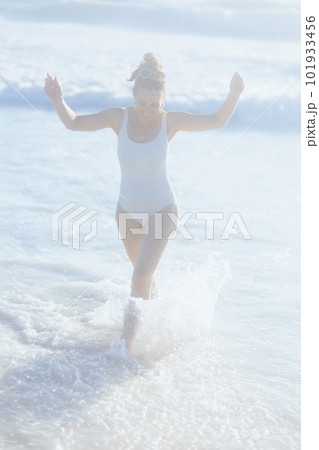 happy stylish woman in swimwear at beach having fun time 101933456