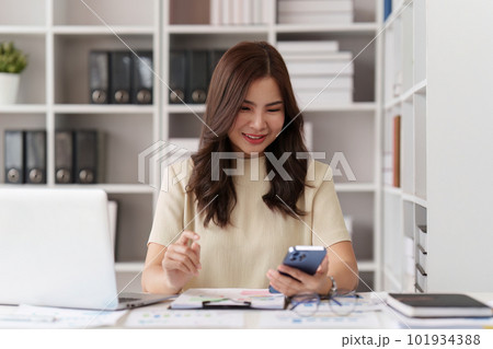 Beautiful Businesswoman completes KYC using an online banking program in order to open a digital savings account. The definition of cyber security 101934388