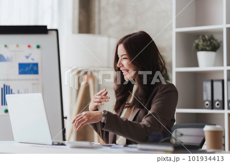 Confident business person executive using laptop computer, having video conference call virtual meeting, advisor finance, research, fund Confident business person executive using laptop computer, having video conference call virtual meeting, advisor finance, research, fund 101934413