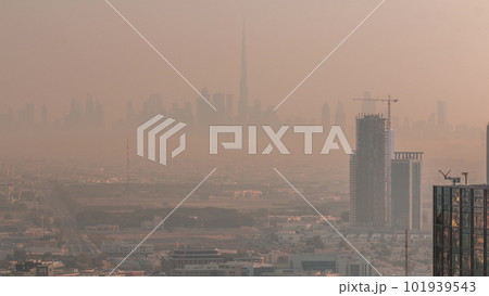 Dubai Downtown skyline row of skyscrapers with tallset tower aerial morning timelapse. UAE Dubai Downtown skyline row of skyscrapers with tallset tower aerial morning timelapse. UAE 101939543