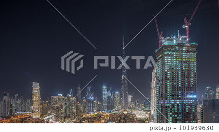Dubai Downtown night timelapse with tallest skyscraper and other towers 101939630