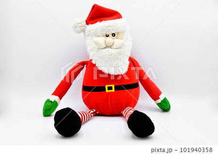 Santa claus figure from plush toy used in new year and christmas celebrations, isolated on white background 101940358